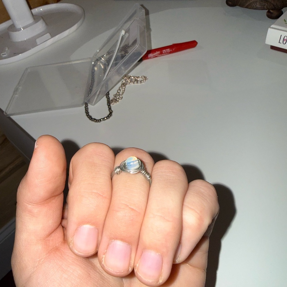 Charming Silver Ring with Blue Accent